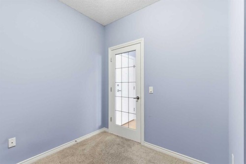 1302-1010 Arbour Lake Road Nw, Calgary, AB - Indoor Photo Showing Other Room
