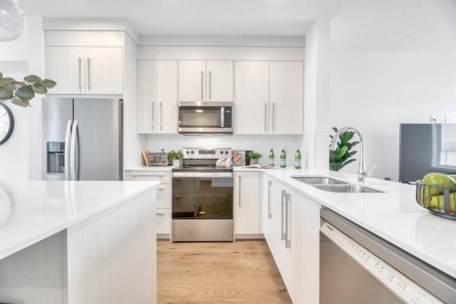 220 Creekstone Drive Sw, Calgary, AB - Indoor Photo Showing Kitchen With Stainless Steel Kitchen With Double Sink With Upgraded Kitchen
