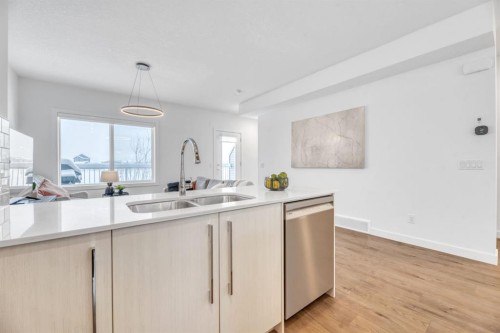 220 Creekstone Drive Sw, Calgary, AB - Indoor Photo Showing Kitchen With Double Sink