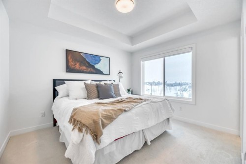 220 Creekstone Drive Sw, Calgary, AB - Indoor Photo Showing Bedroom
