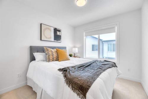 220 Creekstone Drive Sw, Calgary, AB - Indoor Photo Showing Bedroom