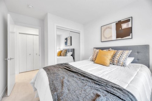 220 Creekstone Drive Sw, Calgary, AB - Indoor Photo Showing Bedroom
