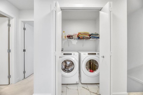 220 Creekstone Drive Sw, Calgary, AB - Indoor Photo Showing Laundry Room