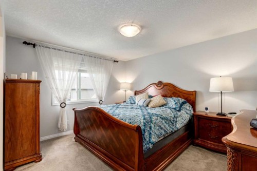 163 Cougarstone Court Sw, Calgary, AB - Indoor Photo Showing Bedroom