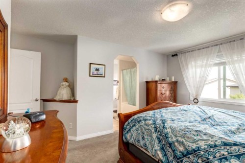 163 Cougarstone Court Sw, Calgary, AB - Indoor Photo Showing Bedroom
