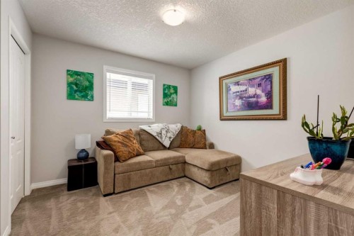 163 Cougarstone Court Sw, Calgary, AB - Indoor Photo Showing Living Room