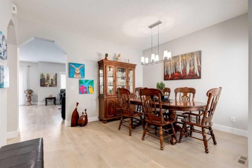 163 Cougarstone Court Sw, Calgary, AB - Indoor Photo Showing Dining Room
