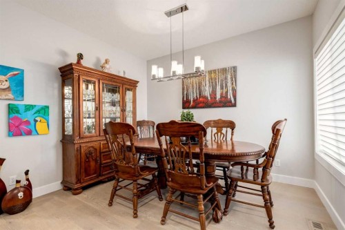 163 Cougarstone Court Sw, Calgary, AB - Indoor Photo Showing Dining Room