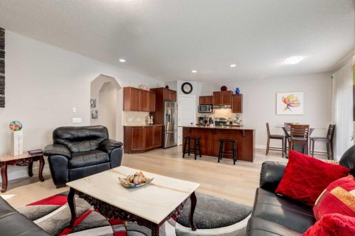 163 Cougarstone Court Sw, Calgary, AB - Indoor Photo Showing Living Room
