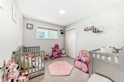 87 Rundleson Way Ne, Calgary, AB - Indoor Photo Showing Bedroom