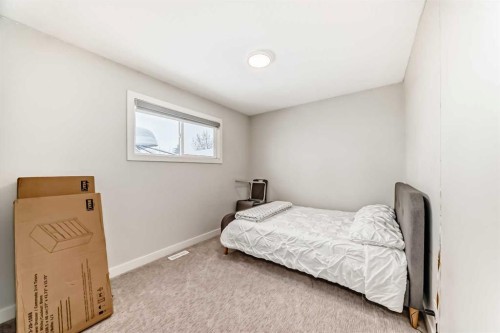 87 Rundleson Way Ne, Calgary, AB - Indoor Photo Showing Bedroom