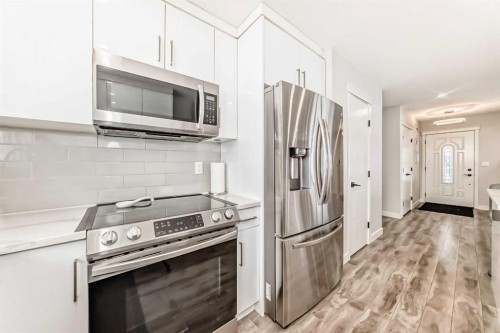 87 Rundleson Way Ne, Calgary, AB - Indoor Photo Showing Kitchen With Stainless Steel Kitchen