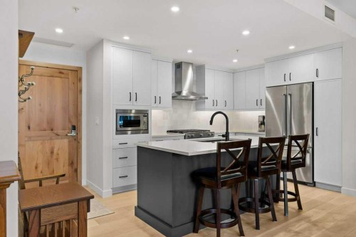 107-1315 Spring Creek Gate, Canmore, AB - Indoor Photo Showing Kitchen With Upgraded Kitchen