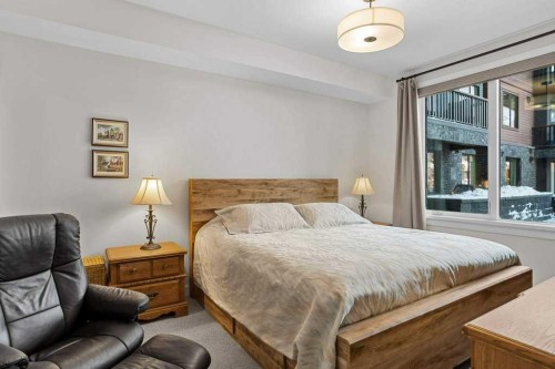 107-1315 Spring Creek Gate, Canmore, AB - Indoor Photo Showing Bedroom