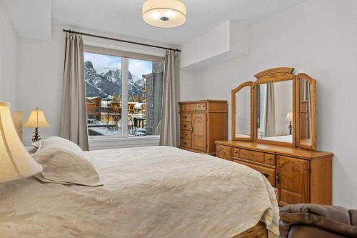 107-1315 Spring Creek Gate, Canmore, AB - Indoor Photo Showing Bedroom