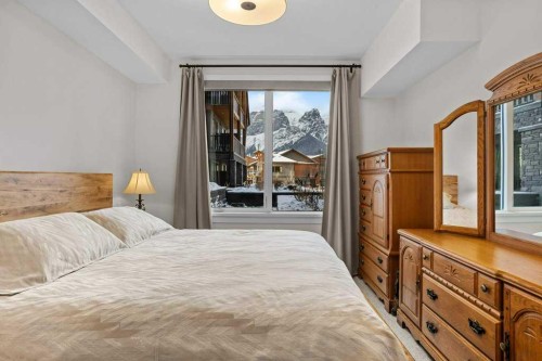 107-1315 Spring Creek Gate, Canmore, AB - Indoor Photo Showing Bedroom