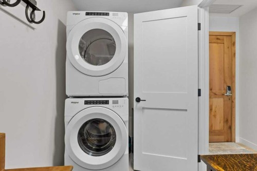 107-1315 Spring Creek Gate, Canmore, AB - Indoor Photo Showing Laundry Room