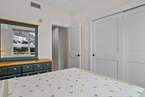 107-1315 Spring Creek Gate, Canmore, AB - Indoor Photo Showing Bedroom