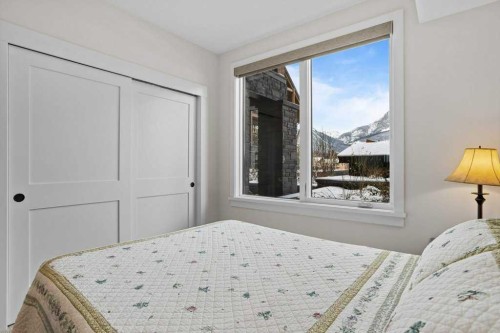 107-1315 Spring Creek Gate, Canmore, AB - Indoor Photo Showing Bedroom