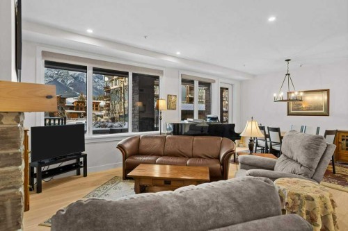 107-1315 Spring Creek Gate, Canmore, AB - Indoor Photo Showing Living Room