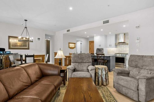 107-1315 Spring Creek Gate, Canmore, AB - Indoor Photo Showing Living Room