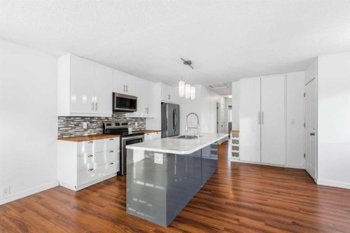 2 Woodfern Road Sw, Calgary, AB - Indoor Photo Showing Kitchen With Upgraded Kitchen