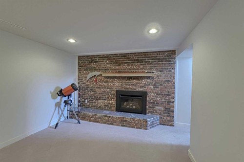 51 Hollyburn Road Sw, Calgary, AB - Indoor With Fireplace