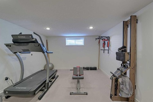 51 Hollyburn Road Sw, Calgary, AB - Indoor Photo Showing Gym Room