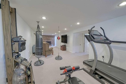 51 Hollyburn Road Sw, Calgary, AB - Indoor Photo Showing Gym Room