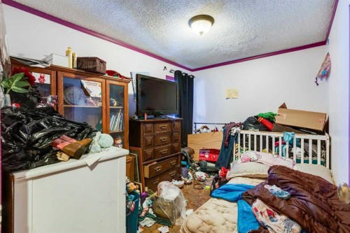 525 1 Street Se, Diamond Valley, AB - Indoor Photo Showing Other Room