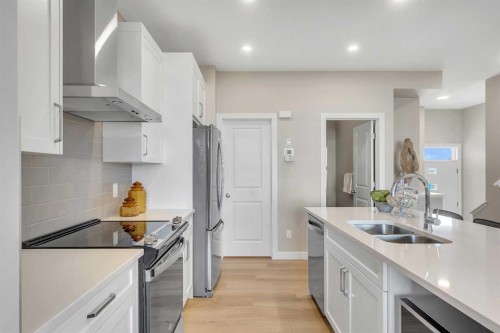430 South Shore Drive, Chestermere, AB - Indoor Photo Showing Kitchen With Stainless Steel Kitchen With Double Sink With Upgraded Kitchen