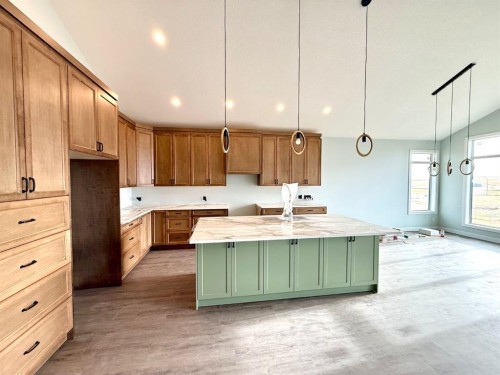 131 Westview Drive, Nanton, AB - Indoor Photo Showing Kitchen With Double Sink