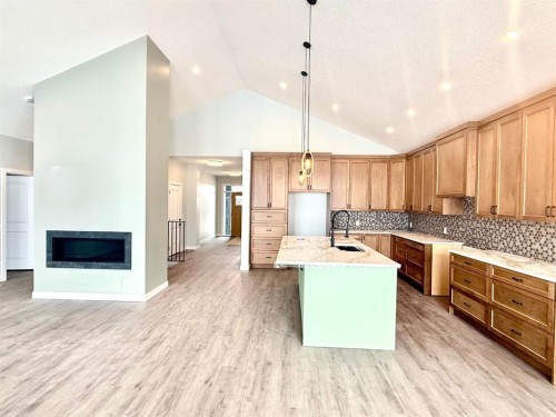 131 Westview Drive, Nanton, AB - Indoor Photo Showing Kitchen With Upgraded Kitchen