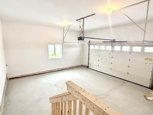 131 Westview Drive, Nanton, AB - Indoor Photo Showing Garage