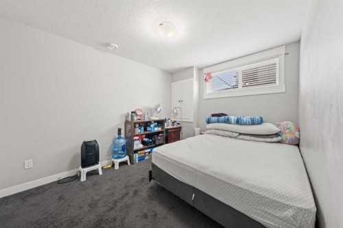 161 Rainbow Falls Glen, Chestermere, AB - Indoor Photo Showing Bedroom