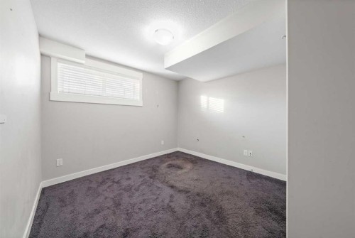 161 Rainbow Falls Glen, Chestermere, AB - Indoor Photo Showing Other Room