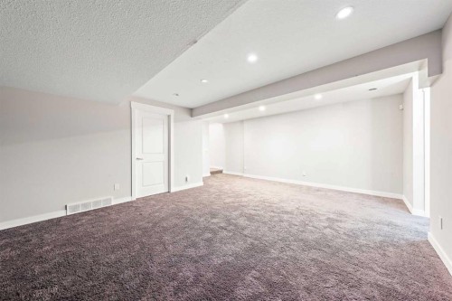 161 Rainbow Falls Glen, Chestermere, AB - Indoor Photo Showing Other Room