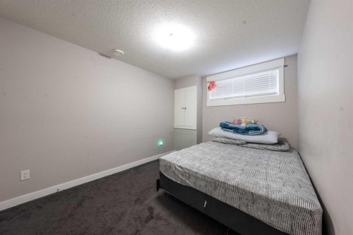161 Rainbow Falls Glen, Chestermere, AB - Indoor Photo Showing Bedroom