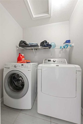 161 Rainbow Falls Glen, Chestermere, AB - Indoor Photo Showing Laundry Room