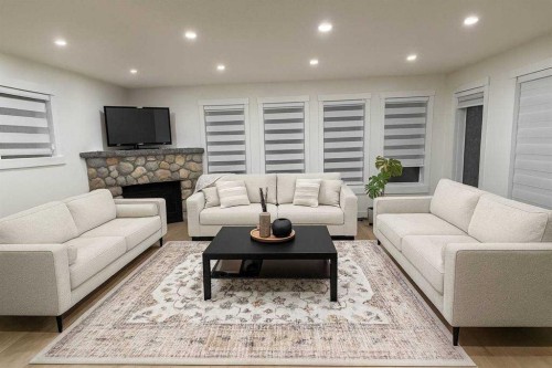 447 Tuscany Ridge Heights Nw, Calgary, AB - Indoor Photo Showing Living Room With Fireplace