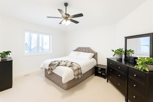 447 Tuscany Ridge Heights Nw, Calgary, AB - Indoor Photo Showing Bedroom
