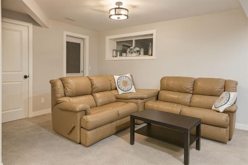 447 Tuscany Ridge Heights Nw, Calgary, AB - Indoor Photo Showing Living Room