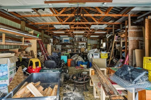 4115 580 Highway, Cremona, AB - Indoor Photo Showing Basement