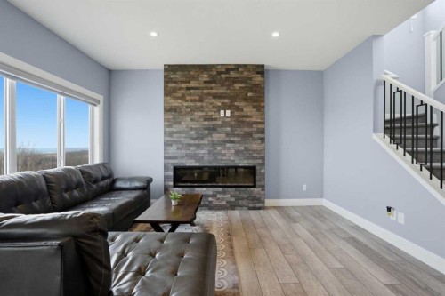 246 Walcrest View Se, Calgary, AB - Indoor Photo Showing Living Room With Fireplace