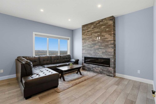 246 Walcrest View Se, Calgary, AB - Indoor Photo Showing Living Room With Fireplace
