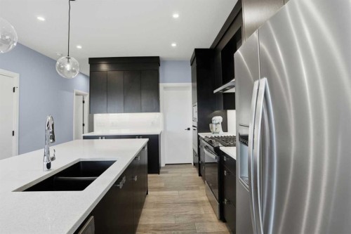 246 Walcrest View Se, Calgary, AB - Indoor Photo Showing Kitchen With Stainless Steel Kitchen With Double Sink With Upgraded Kitchen