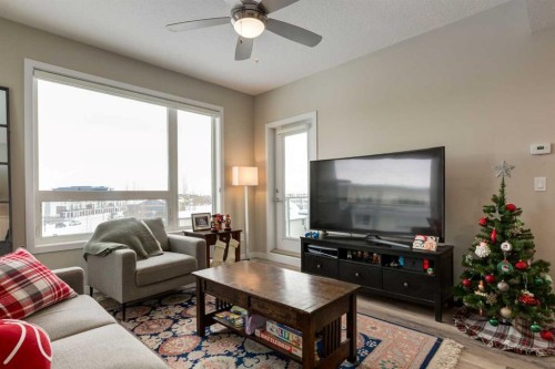 412-8531 8A Avenue Sw, Calgary, AB - Indoor Photo Showing Living Room
