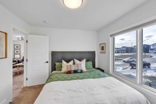 97 Baysprings Gardens Sw, Airdrie, AB - Indoor Photo Showing Bedroom