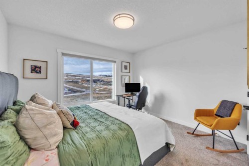 97 Baysprings Gardens Sw, Airdrie, AB - Indoor Photo Showing Bedroom