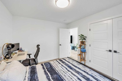 97 Baysprings Gardens Sw, Airdrie, AB - Indoor Photo Showing Bedroom